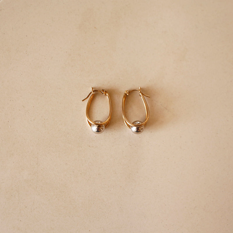 Gold Double Oval Hoop Earrings with White Gold Sphere Accent